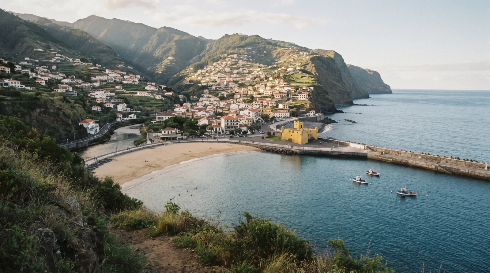 The bay and golden sand of Machico beach in Machico, Madeira, Portugal