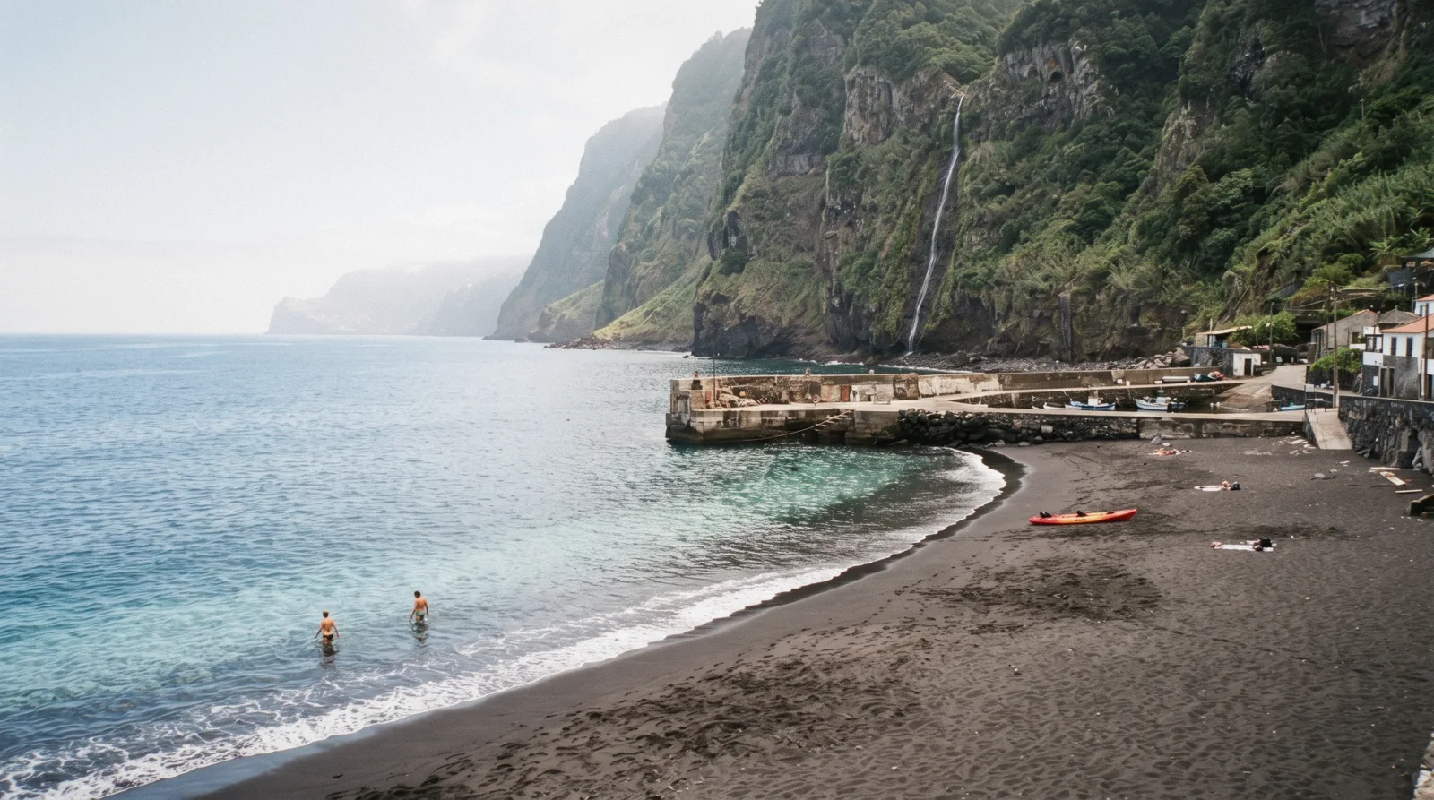 Seixal beach black sand and the harbour on the north coast of Madeira, Portugal
