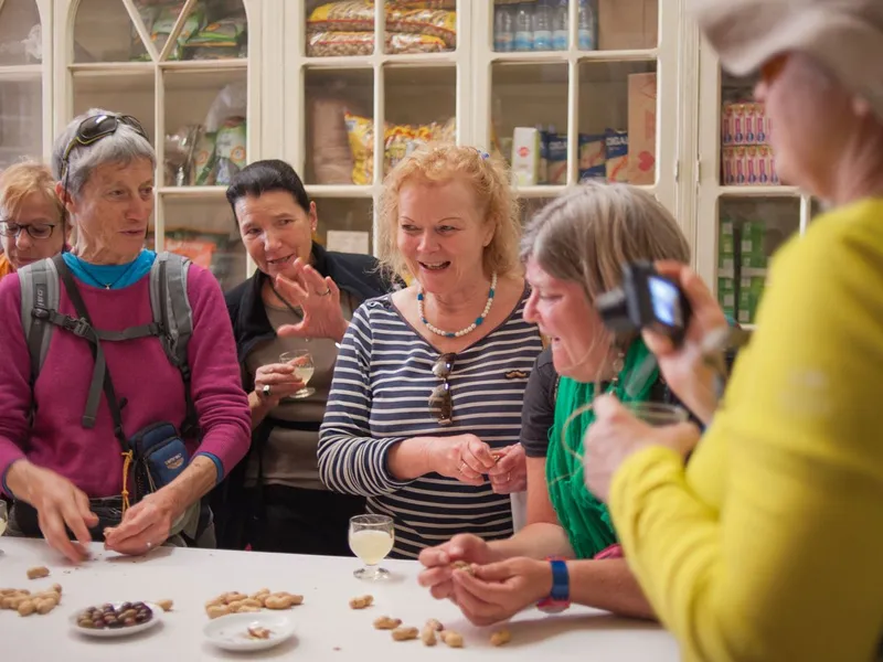 A tasting plate of local Madeiran food and a glass of wine on a Funchal food and wine walking tour in Funchal, Madeira
